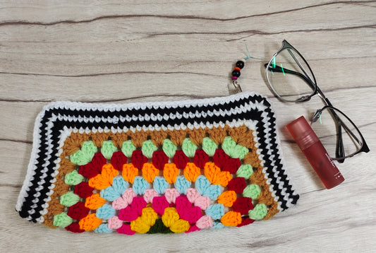Crochet clutch : Elegant lightweight handcrafted pouch.