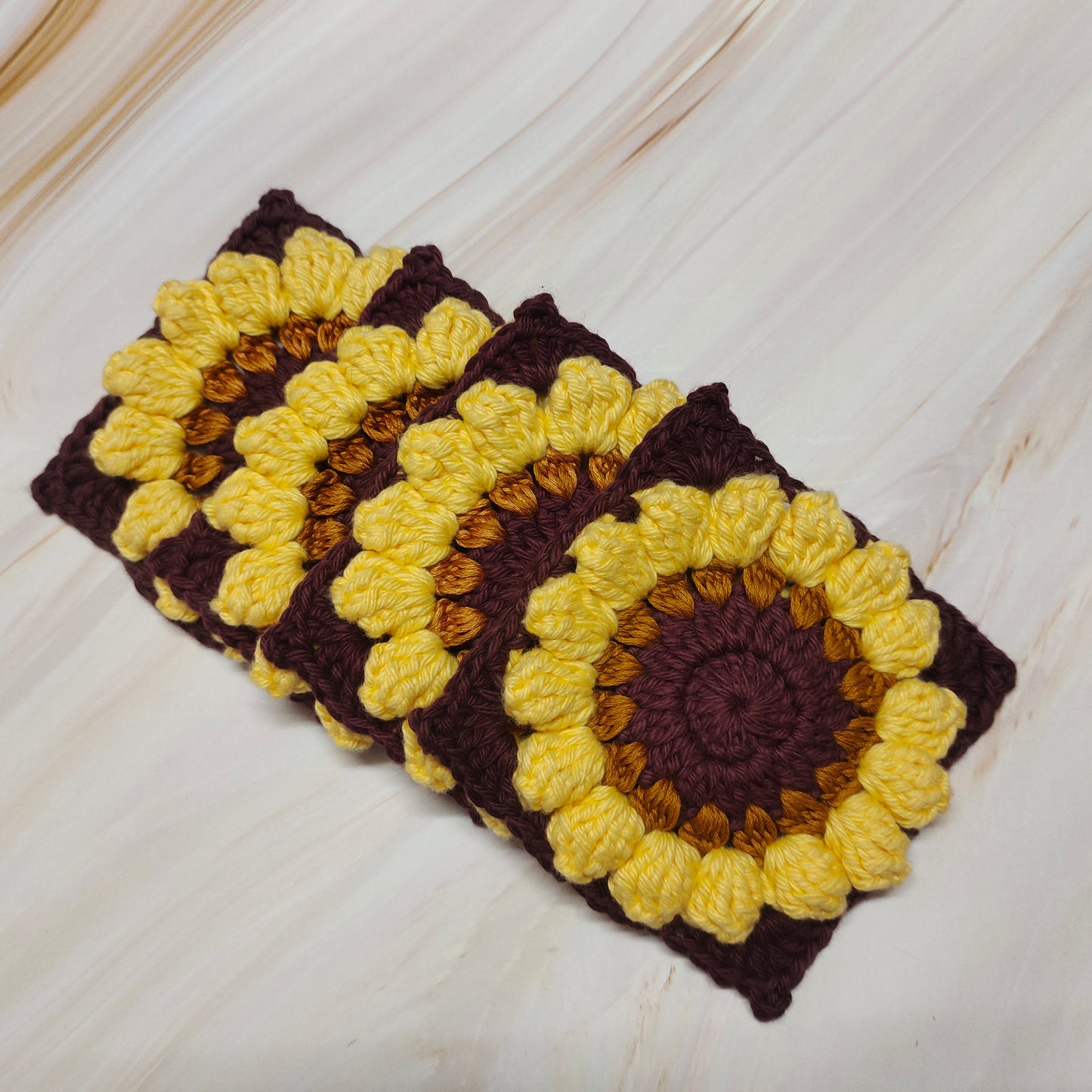 Crochet sunflower square coasters : perfect for tea & coffee cups.